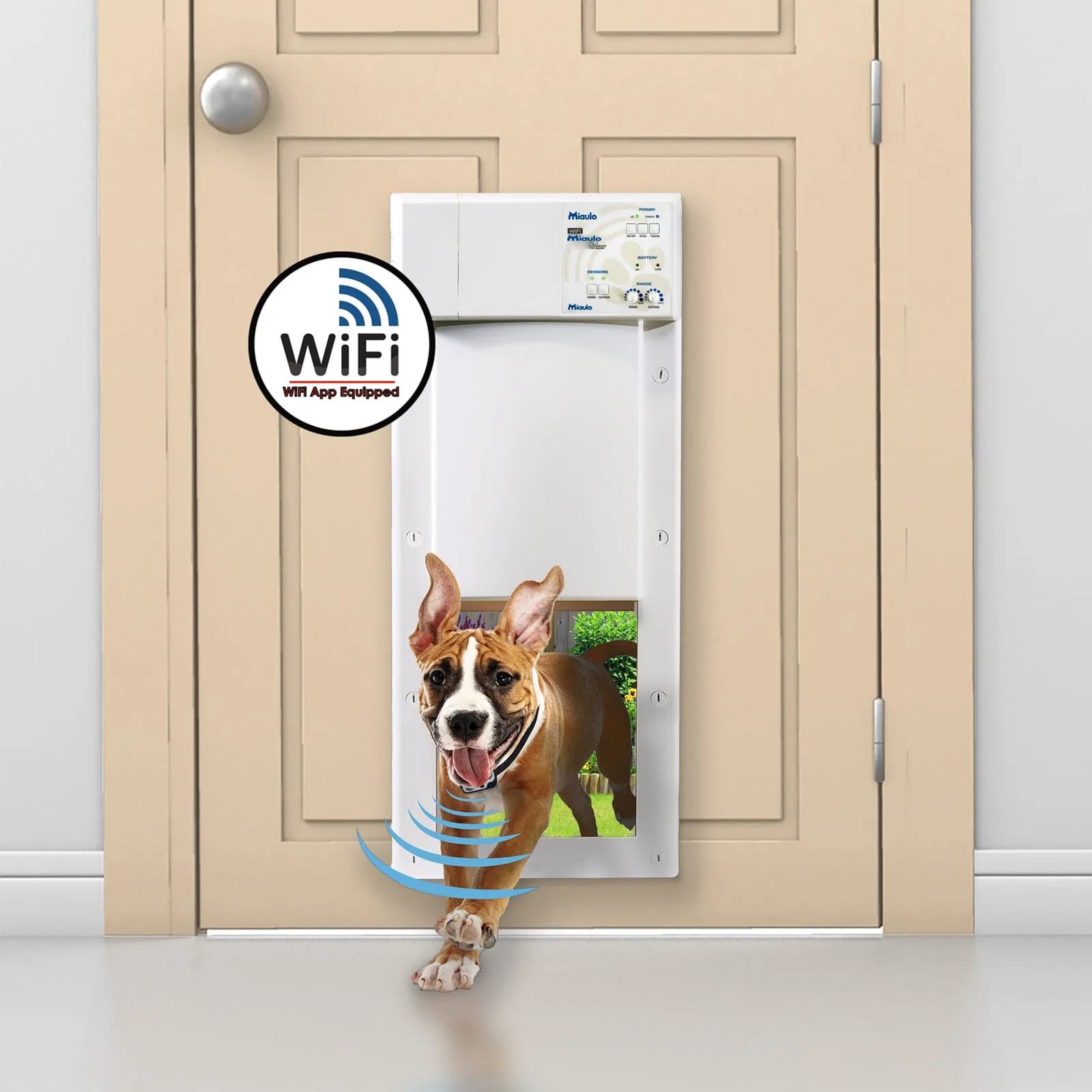 Dog stepping through Miaulo Passage S installed in a door
